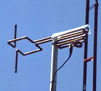 A photograph of the cycloid dipole installed atop the peak of the roof.